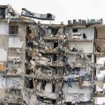 Firefighter BLUNDER Causes Massive Apartment Explosion! Partially collapsed apartment building with exposed rooms and debris