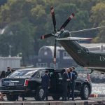 Marine Two Chopper Used For VP’s Sons Golf Lesson Motorcade and helicopter on a waterfront helipad