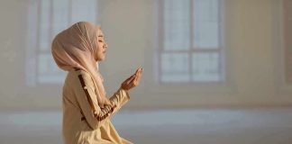 Taxpayer-Funded Ramadan Sparks Lawsuit – OUTRAGE! Woman in hijab praying on a mat indoors