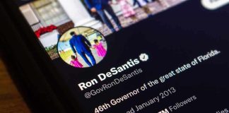 smartphone screen showing a verified social media profile