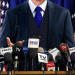 Trump APPOINTS Shock Gabbard Successor! A speaker at a press conference with multiple microphones in front of them