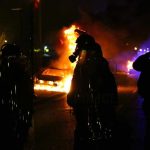 Police FIRE Water Cannons On Belfast Protestors! Riot police stand near burning cars at night