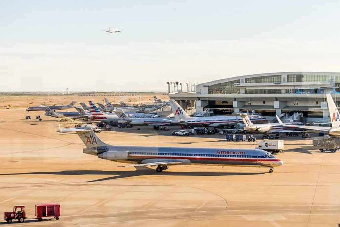 shutterstock_272197994 American Airlines jets at an airport terminal