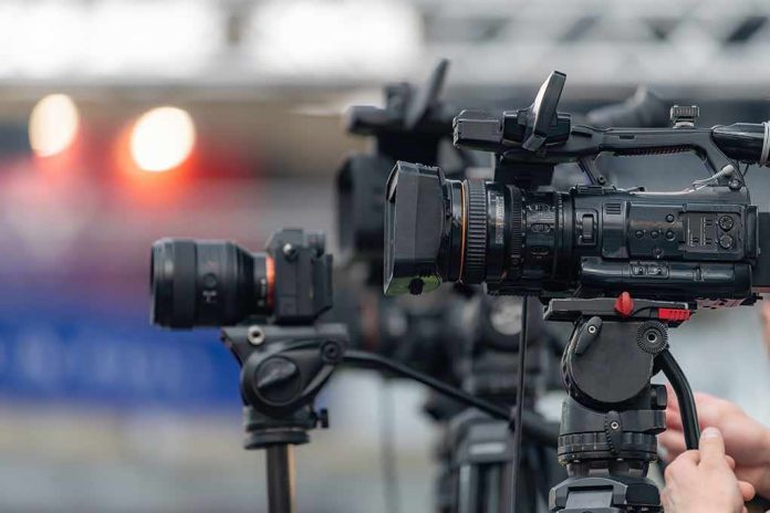 shutterstock_2762343045-4 Professional video cameras on tripods