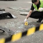 Border Bomb Plot Stopped – Seconds From Exploding Forensic investigator marking evidence at crash scene