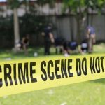 Central Park Murder Shocks Morning Crowd crime scene tape cordoning off a grassy area