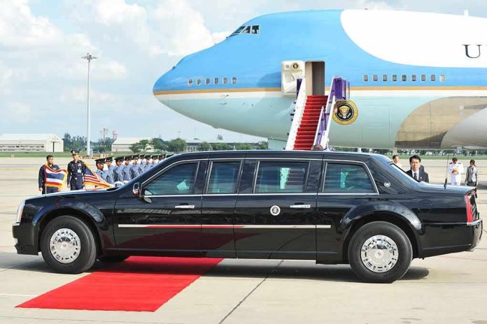 shutterstock_315613541 Presidential limousine beside a large blue-and-white jet on a runway