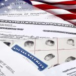 U.S. immigration and naturalization documents with American flag
