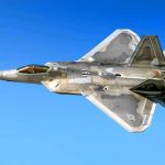 US F-22 Raptor Costs Taxpayers $85,325 Per Hour Stealth fighter jet in flight against a clear blue sky