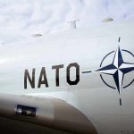 Putins Reveals Next Target – Nation Braced For Invasion Aircraft fuselage with NATO emblem and lettering