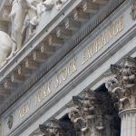 State BANKRUPT – Governor Begs Millionaires to Come Back Facade of the New York Stock Exchange featuring sculptures and gold lettering