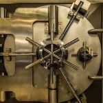 Daylight Heist Strikes Strip Club – $25k In Singles Stolen! Vault door with steel locking wheel and handle