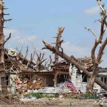 Home EXPLOSION Rocks Neighborhood – Firefighters Injured! Storm-damaged house with fallen trees and debris