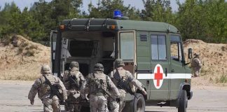 Injured U.S Soldiers Had To GOOGLE Their Way Out Of Carnage Soldiers running towards a medical vehicle during a military operation
