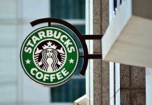 Starbucks coffee shop sign on building exterior