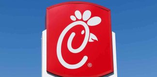 Chick-fil-A Reveals First NEW Item in Over 10 Years! Chick-fil-A sign against clear blue sky