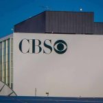 CBS Drops DISGRACED Anchor After a Decade on Channel CBS building exterior with logo and satellite dishes