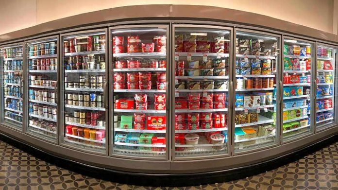 Grocery store freezer aisle with ice cream and frozen desserts