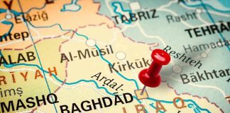 Map of Iraq with red pushpin near Baghdad