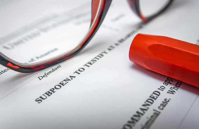 Subpoena document with red highlighter and eyeglasses