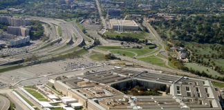 Hegseth’s Military Promotion Blocks Faces Congressional Reckoning The Pentagon building with surrounding highways and parking lots
