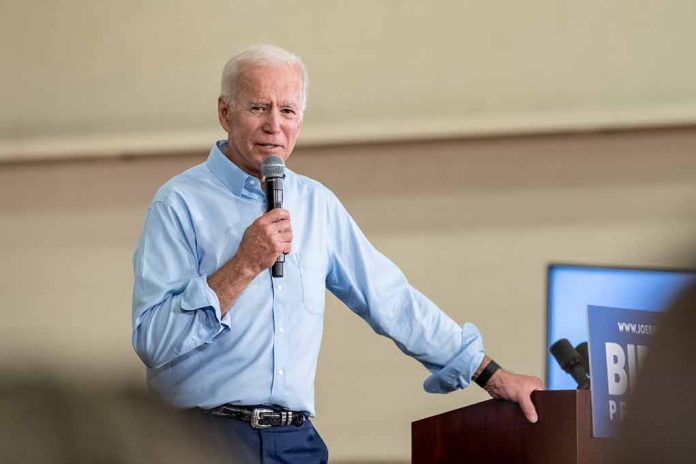 Man speaking into microphone at event podium indoors