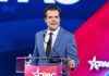 Person speaking at podium with CPAC backdrop.