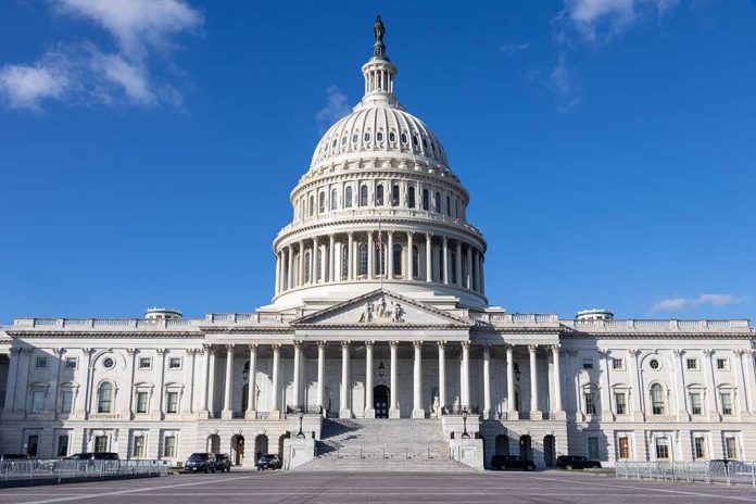 U.S. Capitol building under a clear blue sky.