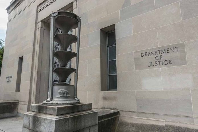 Department of Justice building with sculpture outside.