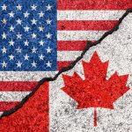 USA and Canada flag divided by crack