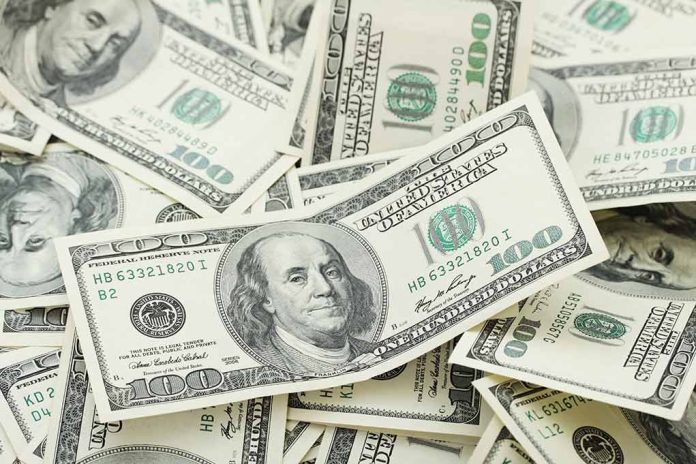 150954545 featured image Pile of US one hundred dollar bills