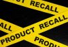 Yellow tape with product recall text crossing
