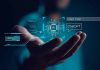 Hand holding digital AI and ChatGPT graphics