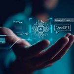 Hand holding digital AI and ChatGPT graphics