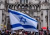Israeli flag at a crowded outdoor event