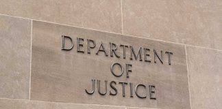 Department of Justice sign on stone building