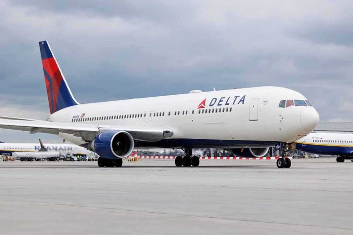 2305553471 featured image Delta Airlines airplane on airport runway, cloudy sky