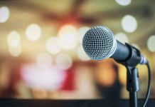 Microphone with blurred lights in the background