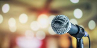 Microphone with blurred lights in the background