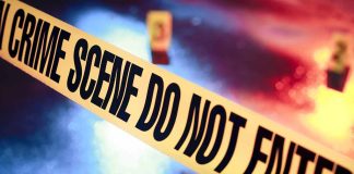 Crime scene tape with do not enter text