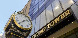 Clock in front of Trump Tower building entrance