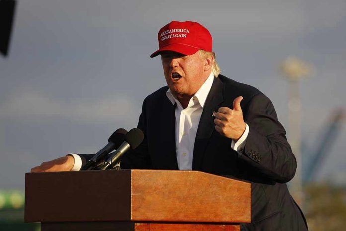 318051161 Person speaking at a podium wearing a red hat.